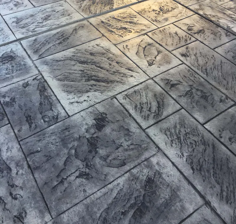 Decorative stamped and colored concrete finish